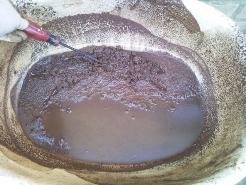 Some of the sludge was captured in the bath, the rest ran down the driveway!