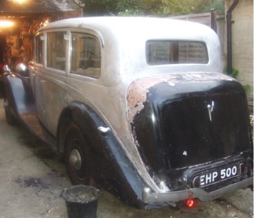 Tackling small areas at a time, the car eventually becomes clear of paint.