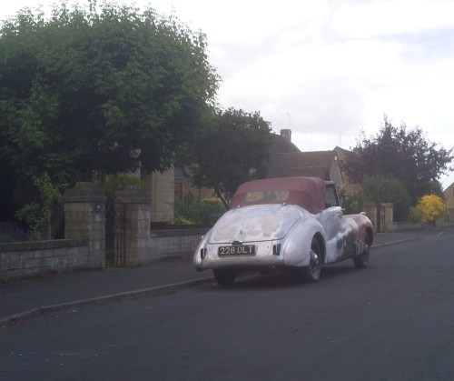 Stripped to bare metal, the Daimler leaves home bound for Shepton Mallet